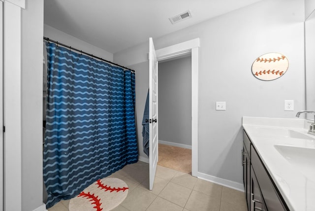 bathroom with vanity and tile patterned floors