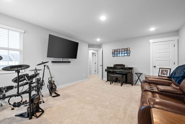 workout room with light colored carpet