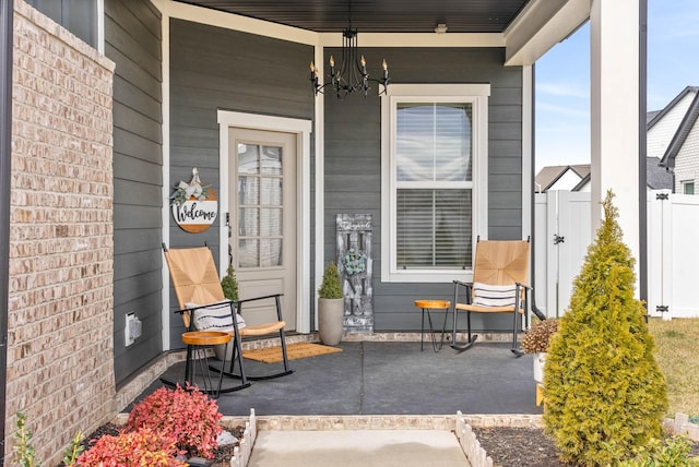 entrance to property featuring a porch