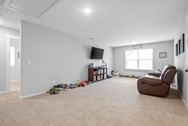 interior space featuring light colored carpet