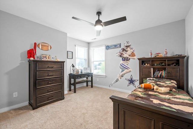 carpeted bedroom with ceiling fan