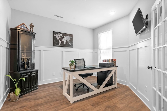 office with dark hardwood / wood-style flooring