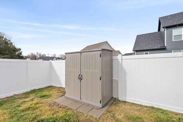 view of outbuilding featuring a yard