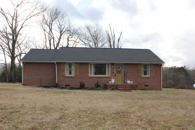 ranch-style house with a front yard