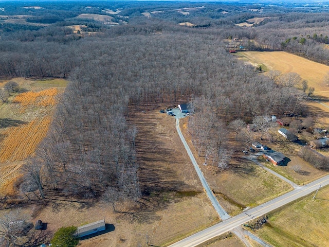 birds eye view of property featuring a rural view