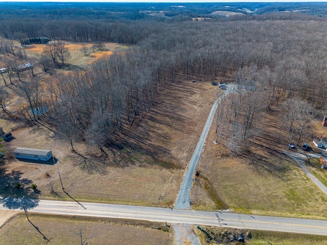 birds eye view of property featuring a rural view