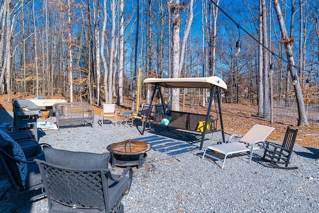 view of patio / terrace with a fire pit