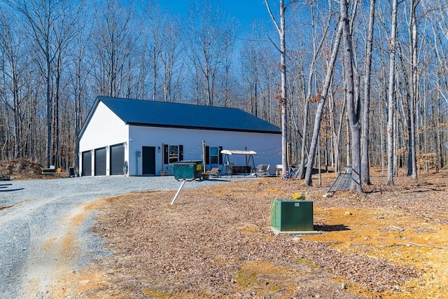 view of outbuilding with a garage