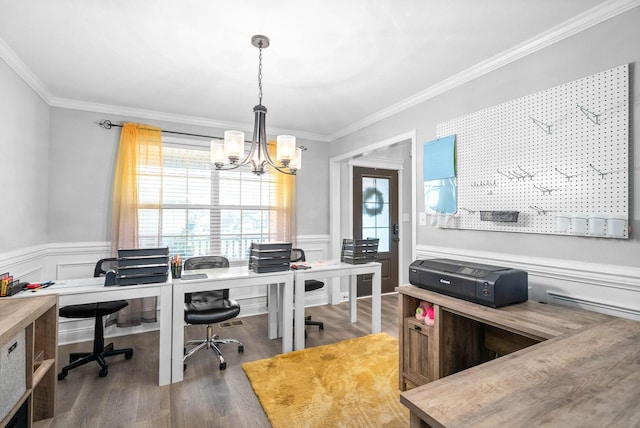 office space featuring crown molding, dark hardwood / wood-style flooring, and an inviting chandelier