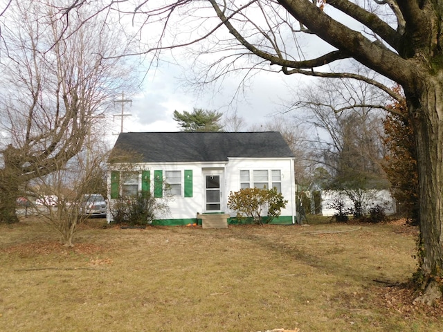 view of front of home with a front yard