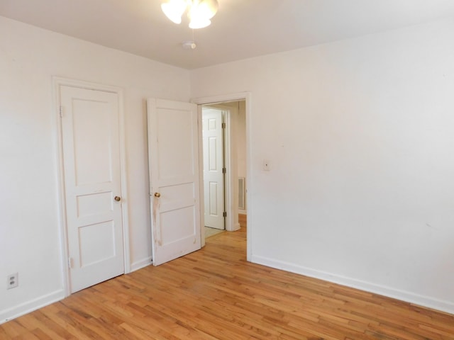 unfurnished bedroom featuring light hardwood / wood-style floors