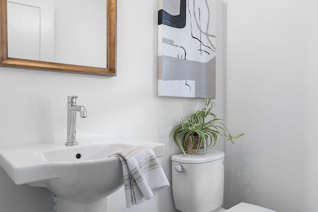 bathroom with sink and toilet