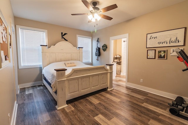 bedroom with dark hardwood / wood-style flooring and ceiling fan