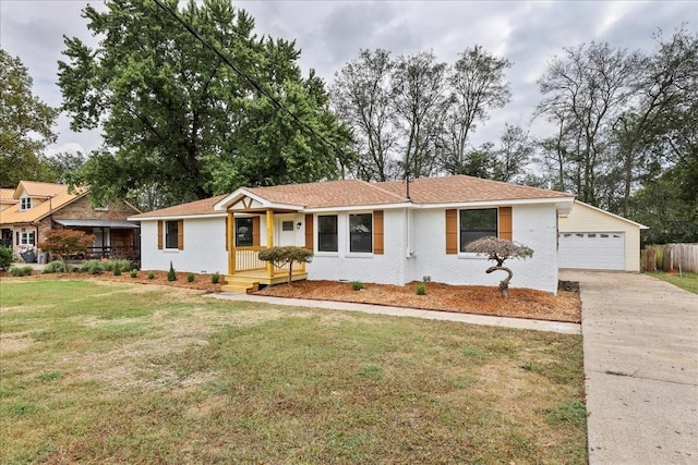 ranch-style home featuring a garage and a front lawn