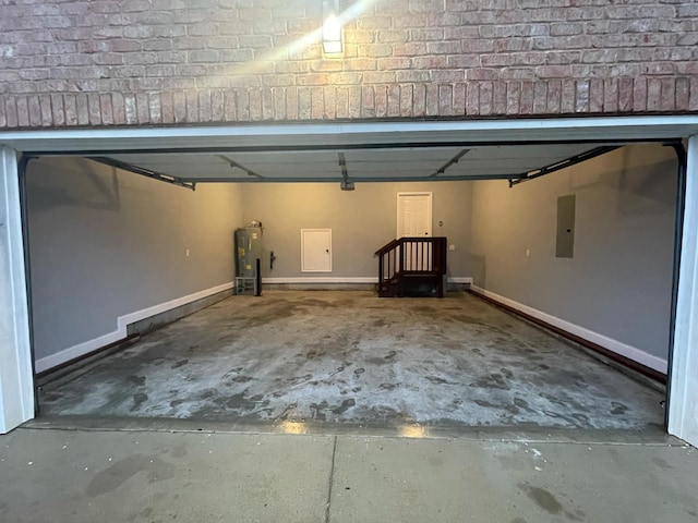 garage with water heater and electric panel