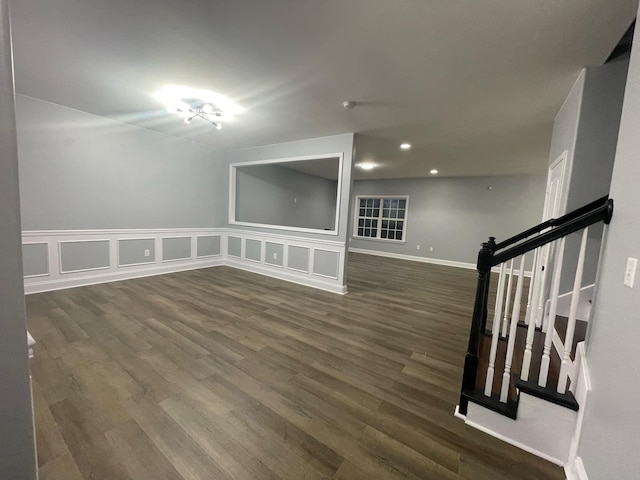 interior space with dark hardwood / wood-style flooring