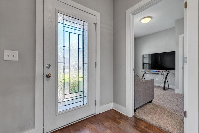 foyer featuring dark wood-type flooring