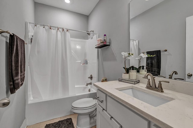 full bathroom with vanity, tile patterned floors, toilet, and shower / bath combo