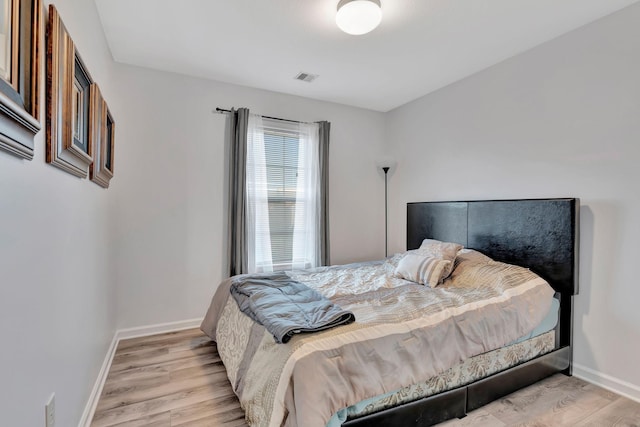 bedroom featuring light hardwood / wood-style flooring