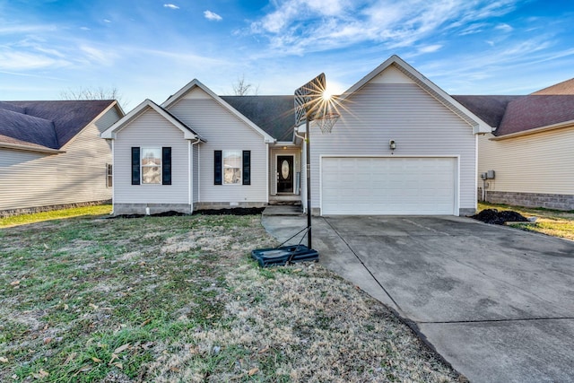 view of front facade with a garage and a front yard