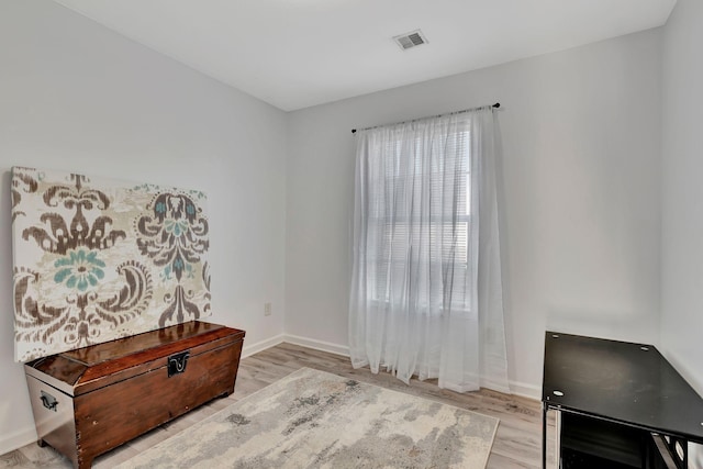 living area featuring light hardwood / wood-style floors