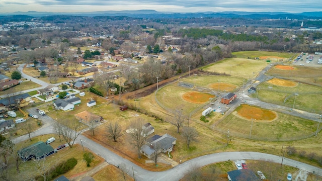 drone / aerial view featuring a mountain view