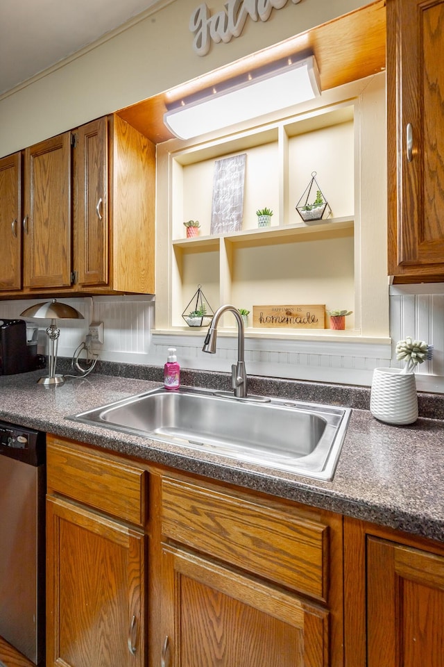 kitchen with sink and stainless steel dishwasher