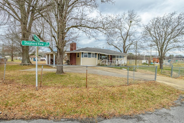 view of front of property with a porch and a front yard