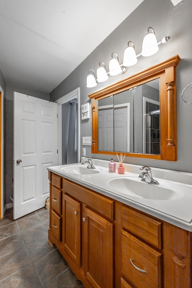 bathroom with vanity and walk in shower