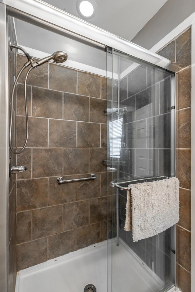 bathroom featuring walk in shower