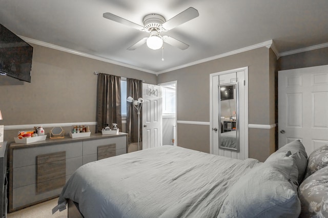 bedroom with light colored carpet, ornamental molding, and ceiling fan