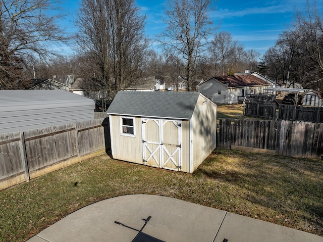 view of outbuilding with a yard