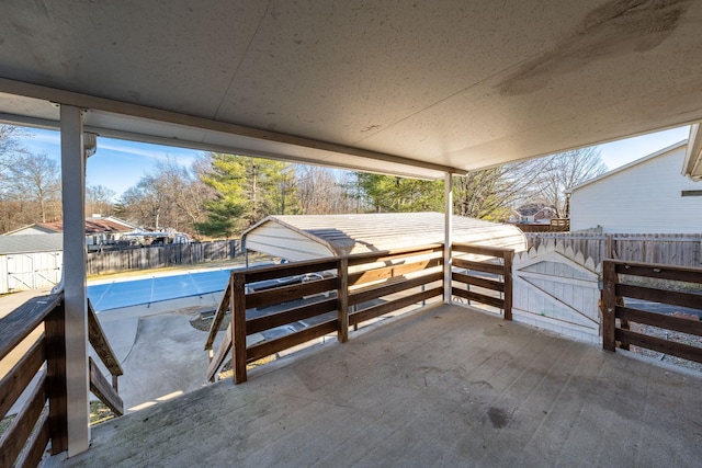 view of patio / terrace featuring a covered pool