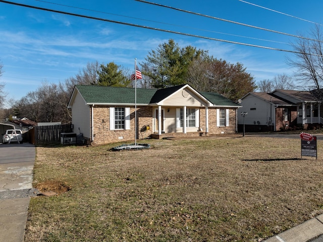 view of front of home featuring a porch and a front lawn