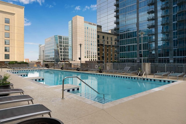 view of swimming pool featuring a patio