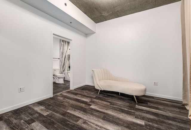 living area featuring dark wood-type flooring