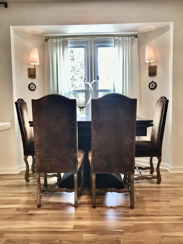 dining area featuring light hardwood / wood-style floors