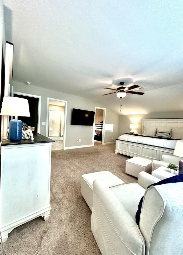 living area featuring light carpet, baseboards, and a ceiling fan