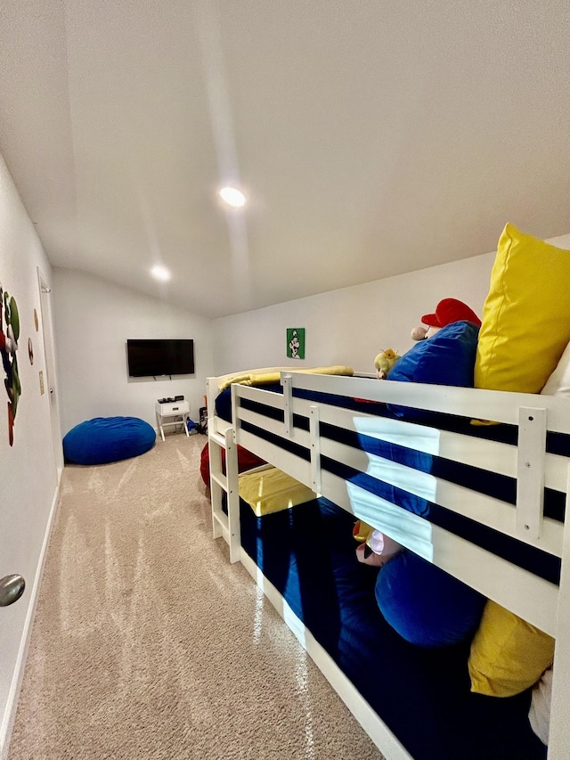 bedroom with vaulted ceiling, recessed lighting, carpet, and baseboards