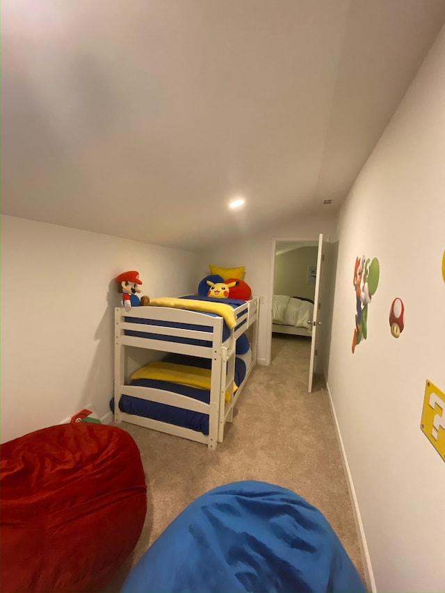 carpeted bedroom with baseboards