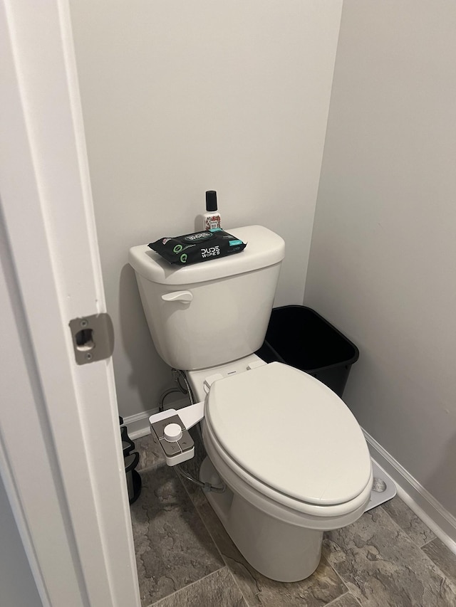 bathroom featuring toilet