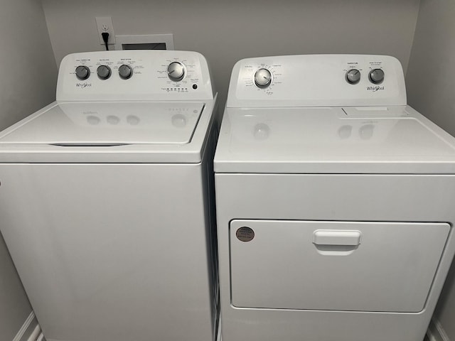 laundry room featuring independent washer and dryer