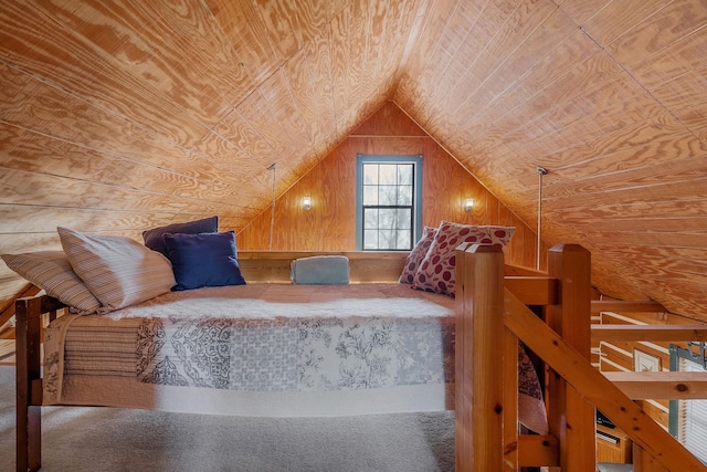 unfurnished bedroom featuring lofted ceiling, carpet, wooden ceiling, and wood walls