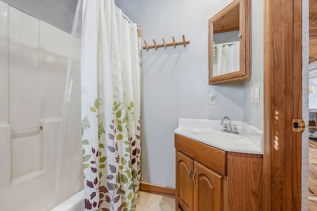 bathroom with vanity and tile patterned floors