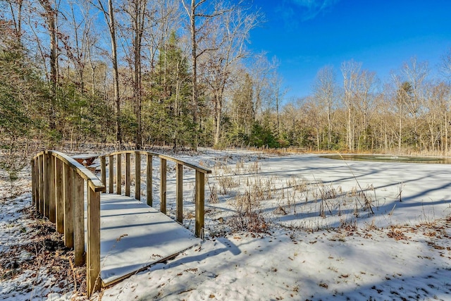 view of snow covered deck