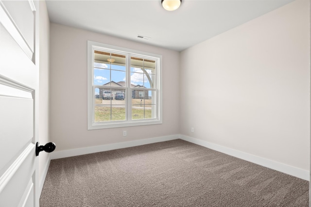 view of carpeted spare room