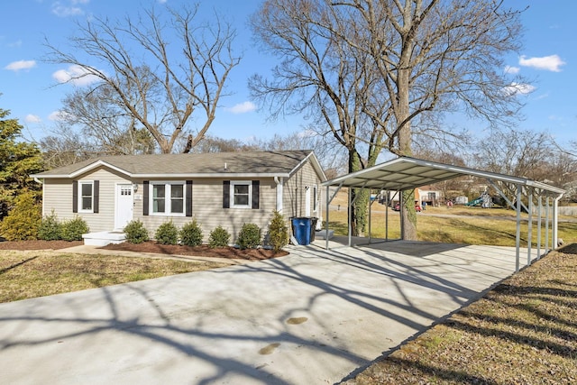 view of home's exterior with a yard and a carport