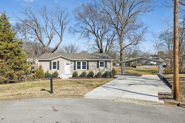 ranch-style home with a carport