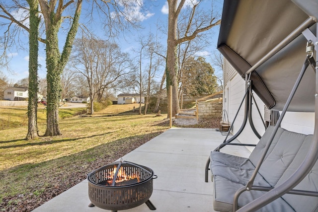 view of patio featuring a fire pit