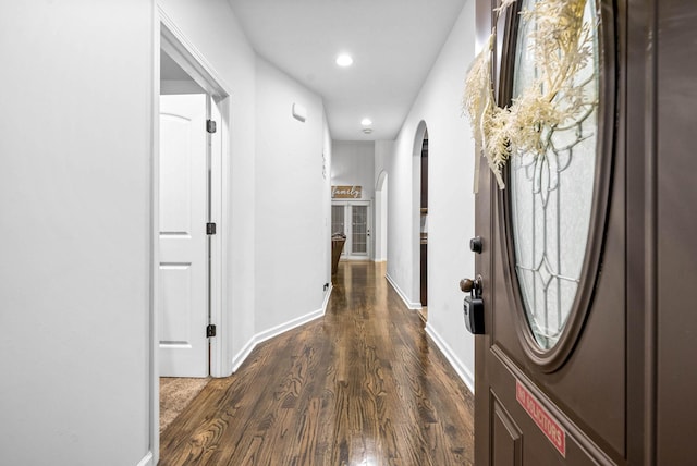 corridor with dark wood-type flooring